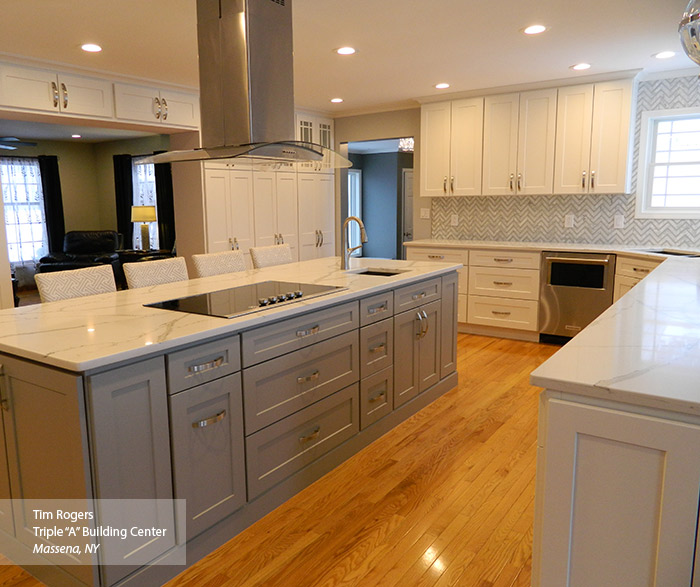 White and gray painted Shaker style kitchen cabinets